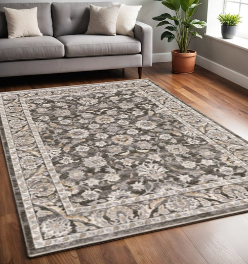 8' X 11' Grey And Ivory Oriental Power Loom Stain Resistant Area Rug With Fringe