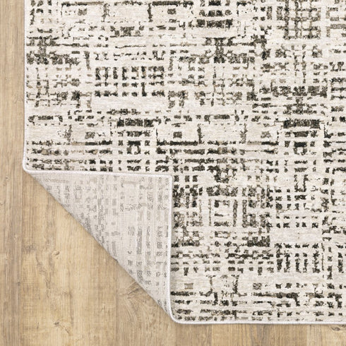 8' X 11' Ivory And Gray Abstract Area Rug