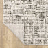 8' X 11' Ivory And Gray Abstract Area Rug