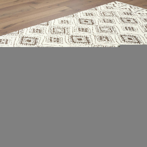 8' X 11' Ivory And Brown Geometric Shag Area Rug