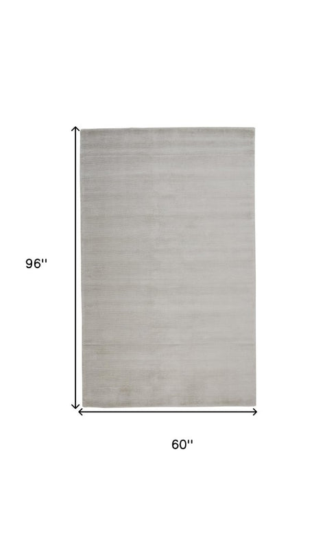 5' X 8' Gray And Silver Hand Woven Area Rug