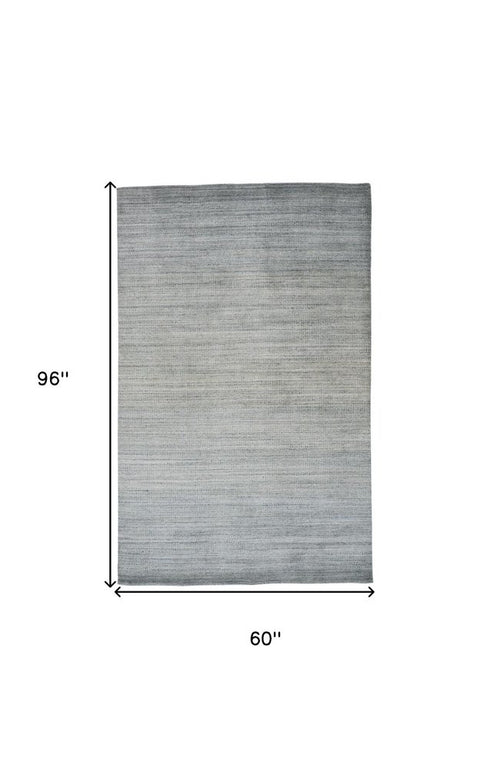 5' X 8' Blue and Gray Ombre Hand Woven Area Rug