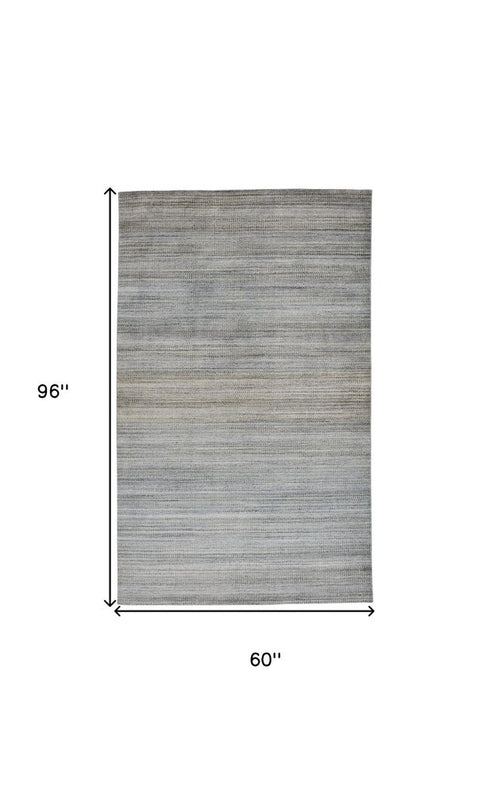 5' X 8' Blue Gray And Purple Ombre Hand Woven Area Rug