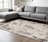 5' X 8' Ivory Gray And Taupe Abstract Stain Resistant Area Rug