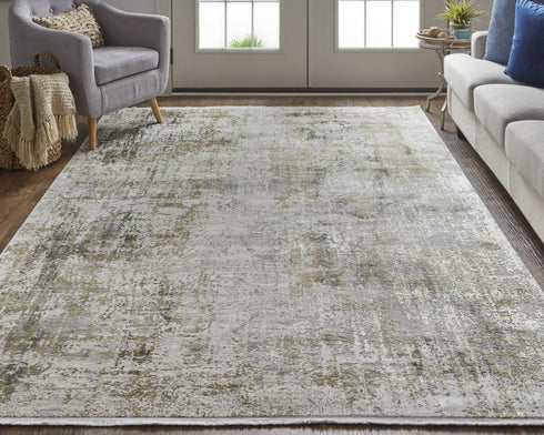 8' X 11' Green Gray And Ivory Abstract Area Rug With Fringe