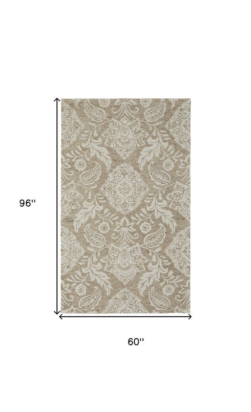 9' X 12' Tan And Ivory Wool Paisley Tufted Handmade Stain Resistant Area Rug