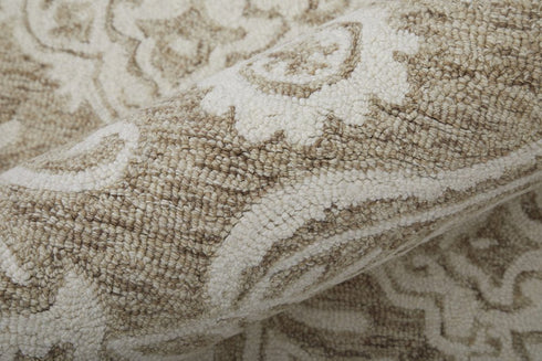 9' X 12' Tan And Ivory Wool Paisley Tufted Handmade Stain Resistant Area Rug