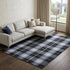 8' X 10' Black Blue And White Abstract Hand Woven Stain Resistant Area Rug
