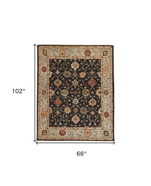 5' X 8' Black And Gold Wool Oriental Hand Knotted Area Rug With Fringe
