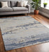 5' X 8' Blue and Ivory Wool Abstract Hand Tufted Area Rug