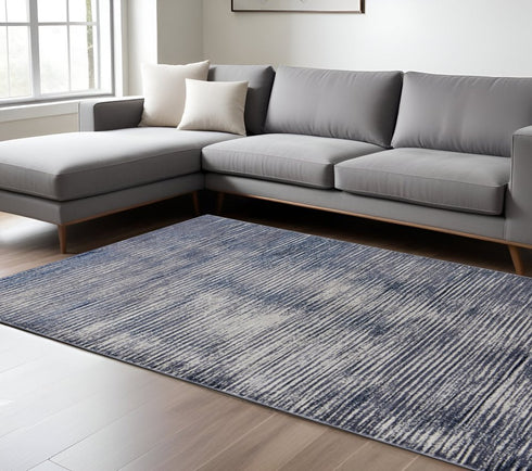 9' X 12' Blue Gray And Ivory Striped Power Loom Distressed Area Rug