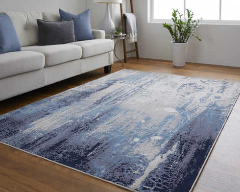 8' X 10' Ivory and Blue Abstract Power Loom Distressed Non Skid Area Rug