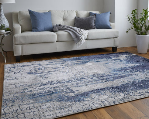 8' X 10' Ivory and Blue Abstract Power Loom Distressed Non Skid Area Rug