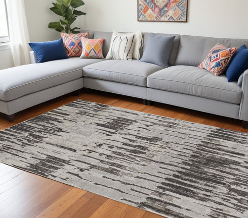 9' X 12' Ivory Brown And Gray Abstract Power Loom Stain Resistant Area Rug