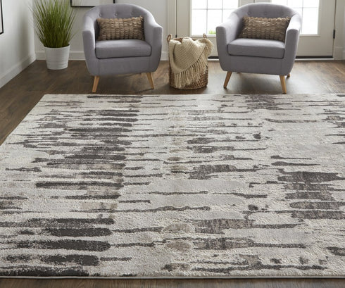 9' X 12' Ivory Brown And Gray Abstract Power Loom Stain Resistant Area Rug