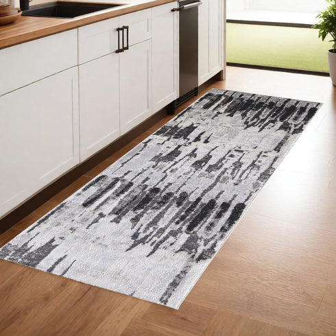9' X 12' Ivory Brown And Gray Abstract Power Loom Stain Resistant Area Rug