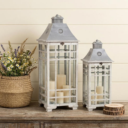 Set of Two White And Silver Distressed Geometric Metal Floor Lantern Candle Holders