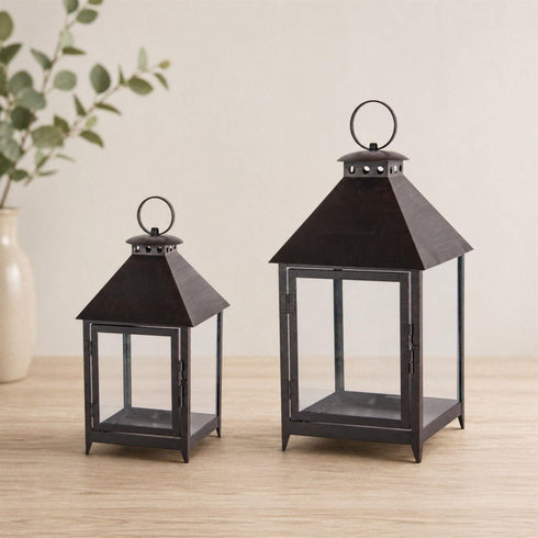 Set of Two Black Geometric Iron And Glass Floor Lantern Candle Holders