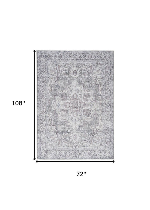 8' X 10' Blue And Pink Floral Power Loom Distressed Washable Area Rug