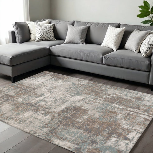 8' X 10' Ivory Brown And Green Abstract Area Rug