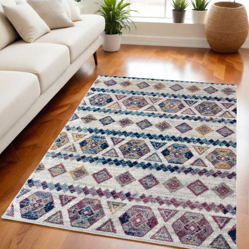 9' X 12' Ivory Blue And Orange Geometric Area Rug