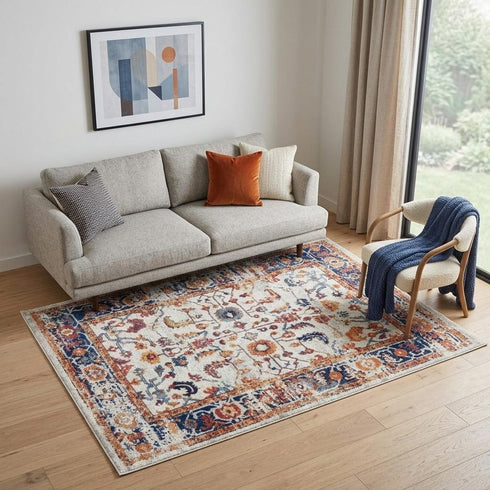 9' X 12' Ivory And Orange Floral Area Rug