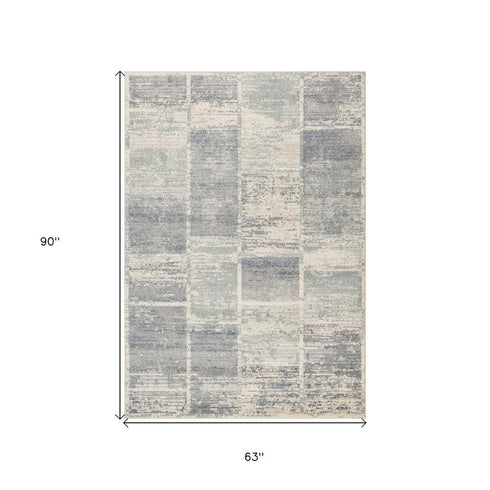 9' X 12' Gray Light Blue And Ivory Geometric Area Rug