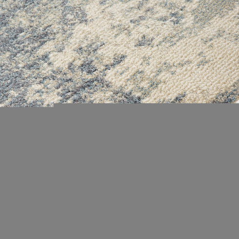 8' X 10' Light Gray Blue And Ivory Abstract Area Rug