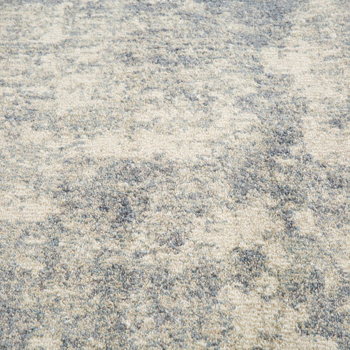 8' X 10' Light Gray Blue And Ivory Abstract Area Rug
