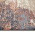 8' X 10' Beige Rust And Blue Abstract Area Rug