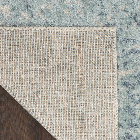 7' X 9' Blue And Ivory Abstract Washable Area Rug