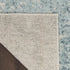 7' X 9' Blue And Ivory Abstract Washable Area Rug
