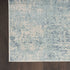 7' X 9' Blue And Ivory Abstract Washable Area Rug