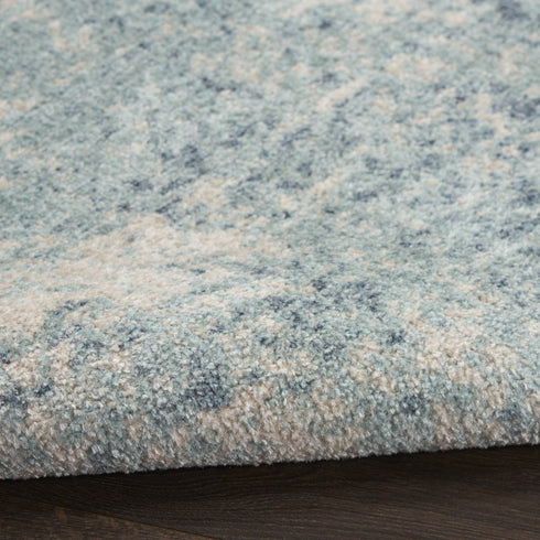 7' X 9' Blue And Ivory Abstract Washable Area Rug