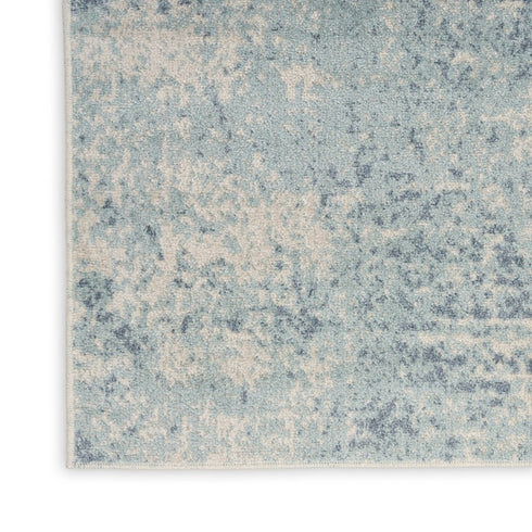 7' X 9' Blue And Ivory Abstract Washable Area Rug