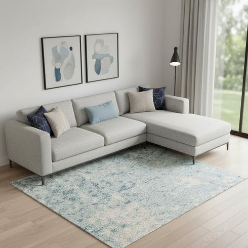 7' X 9' Blue And Ivory Abstract Washable Area Rug