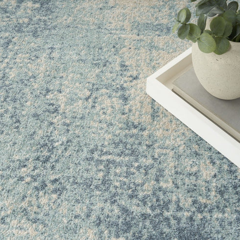 7' X 9' Blue And Ivory Abstract Washable Area Rug