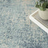 7' X 9' Blue And Ivory Abstract Washable Area Rug