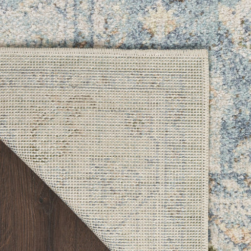 8' X 10' Blue and Ivory Floral Medallion Power Loom Distressed Washable Area Rug