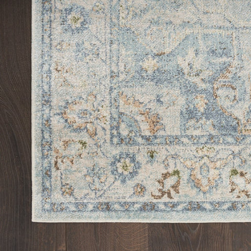 8' X 10' Blue and Ivory Floral Medallion Power Loom Distressed Washable Area Rug