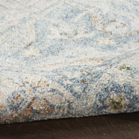 8' X 10' Blue and Ivory Floral Medallion Power Loom Distressed Washable Area Rug