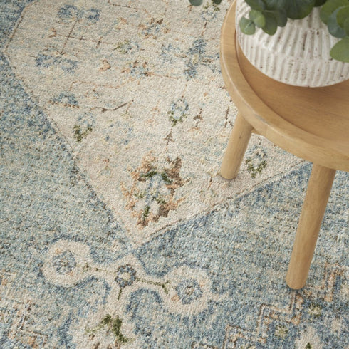 8' X 10' Blue and Silver Floral Medallion Power Loom Distressed Washable Area Rug