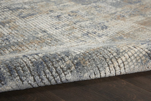 9' X 12' Beige and Blue Abstract Power Loom Distressed Area Rug