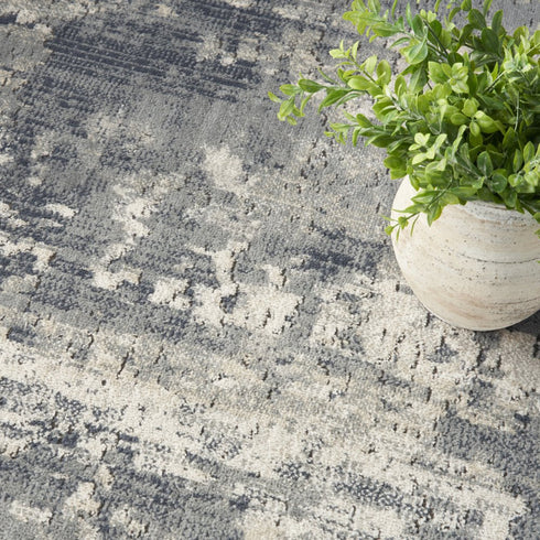 9' X 12' Beige and Gray Abstract Power Loom Area Rug