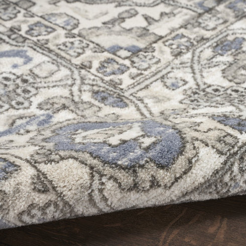 8' X 10' Blue and Ivory Medallion Power Loom Distressed Area Rug