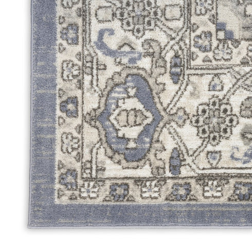 8' X 10' Blue and Ivory Medallion Power Loom Distressed Area Rug