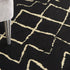 8' X 10' Black and Ivory Abstract Power Loom Distressed Area Rug