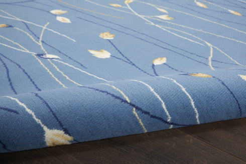 8' X 10' Blue and Beige Floral Power Loom Area Rug