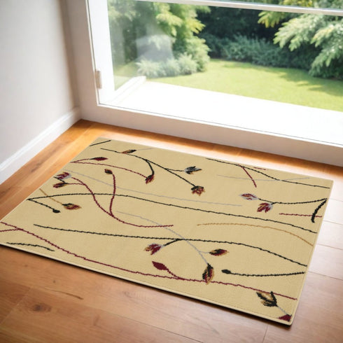 5' X 7' Red and Ivory Floral Power Loom Area Rug