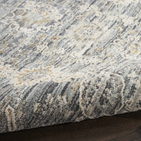 5' X 8' Charcoal Brown And Ivory Floral Distressed Area Rug With Fringe